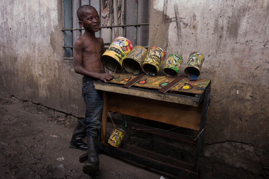 Boy with recycled instrument, Kinshasa (c) Renaud Barret