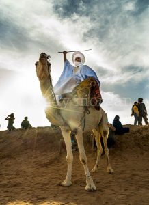 A camel rider at dusk, Taragalte Festival 2017