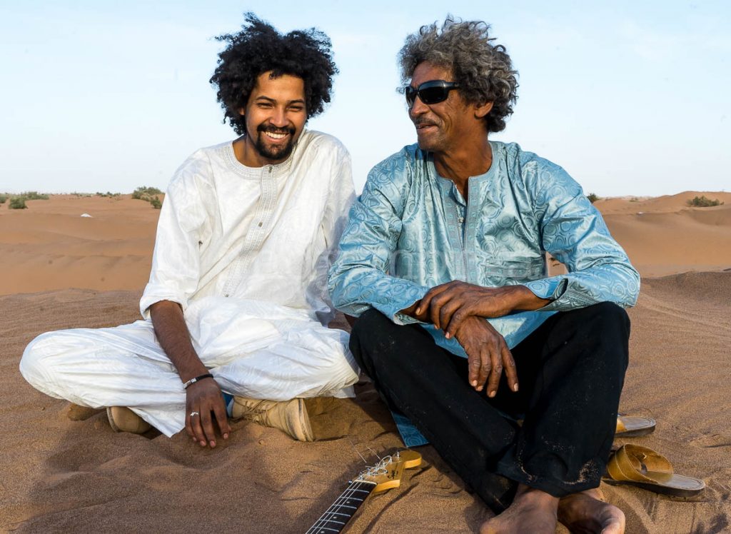 Sadam from Imarhan with Ibrahim from Tinariwen at Taragalte Festival 2017